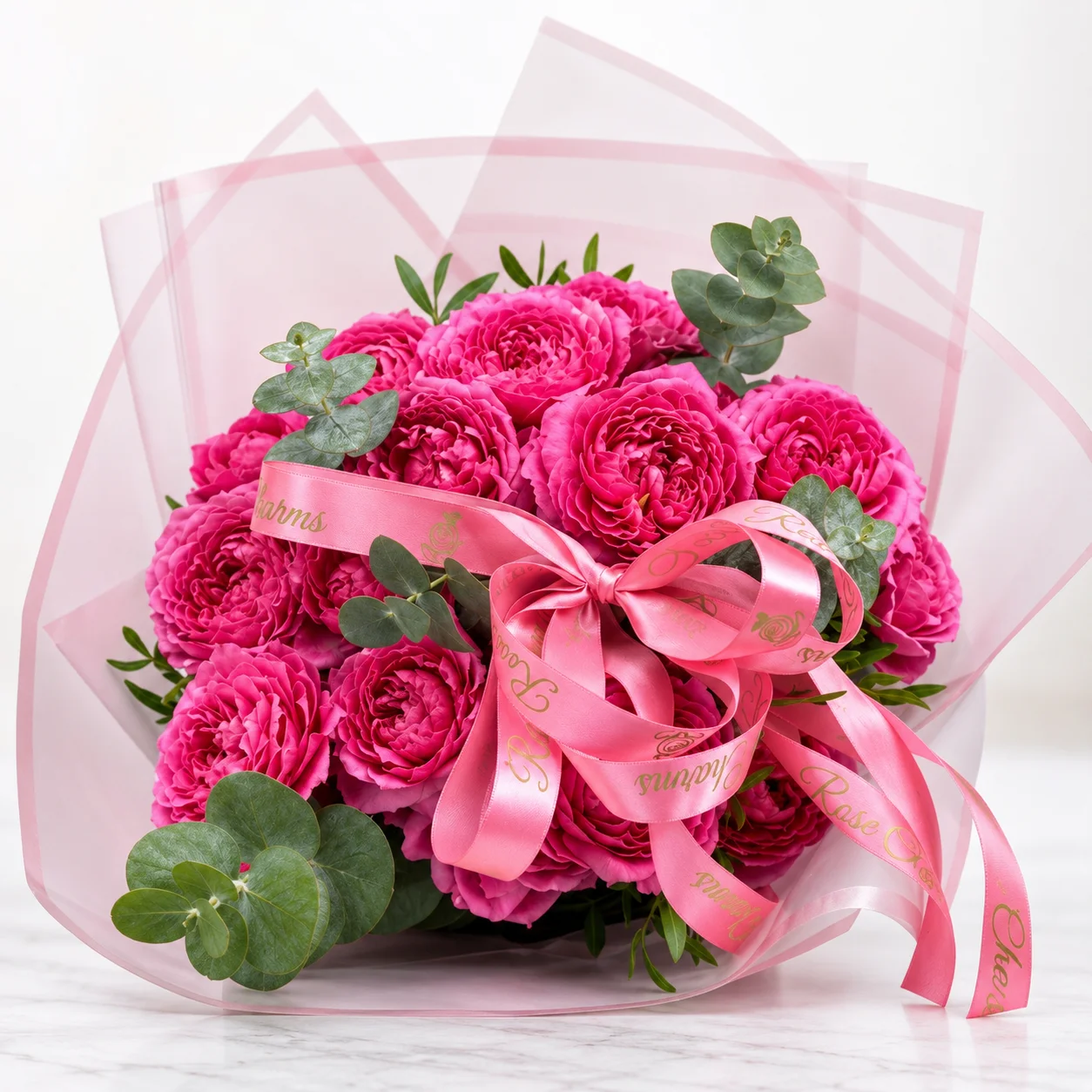 Fresh 5 pink peony roses bouquet with eucalyptus leaves beautifully wrapped for elegant gifting